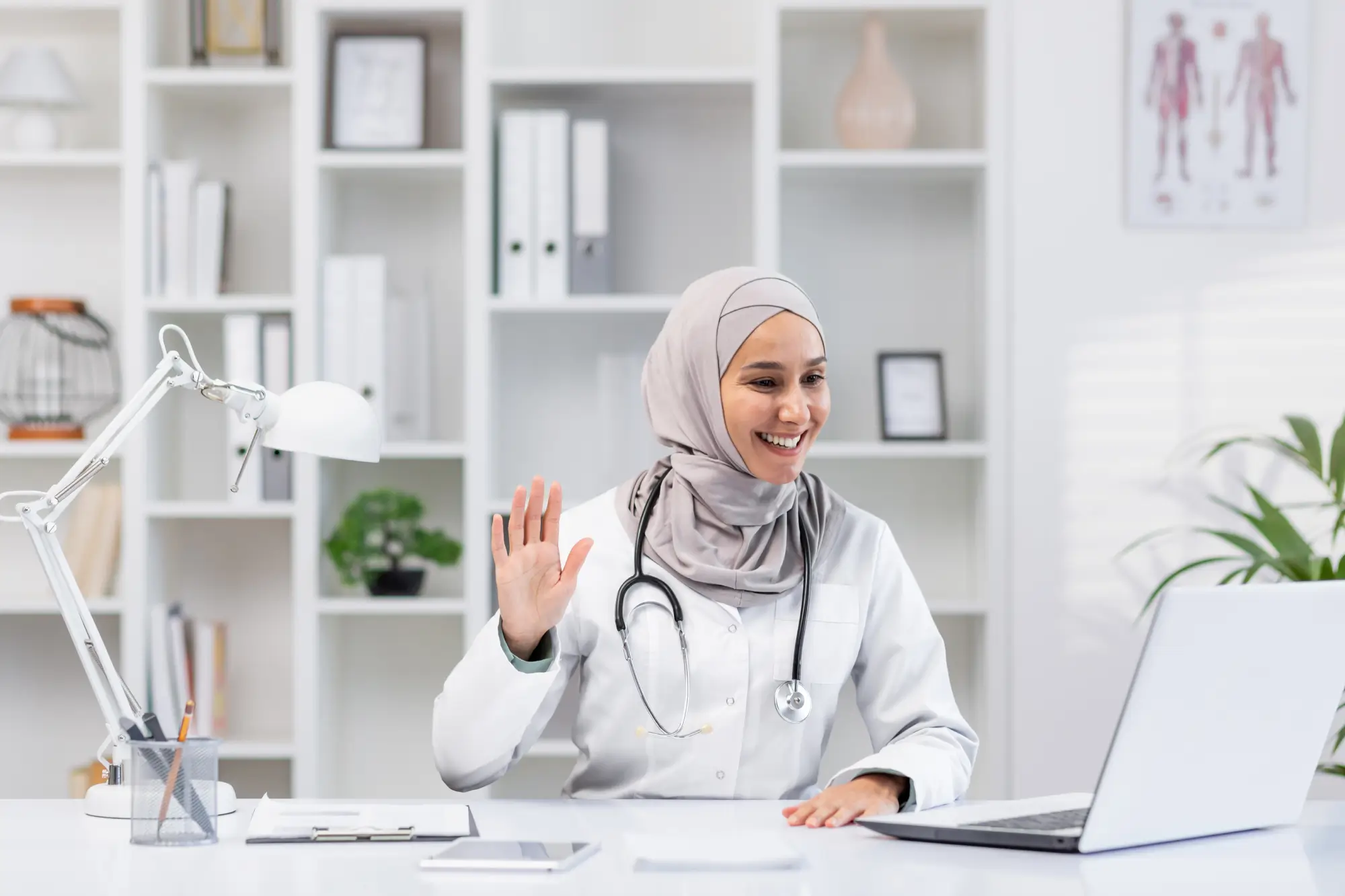 friendly-muslim-female-doctor-greeting-during-a-vi-2024-05-07-17-26-15-utc (1)